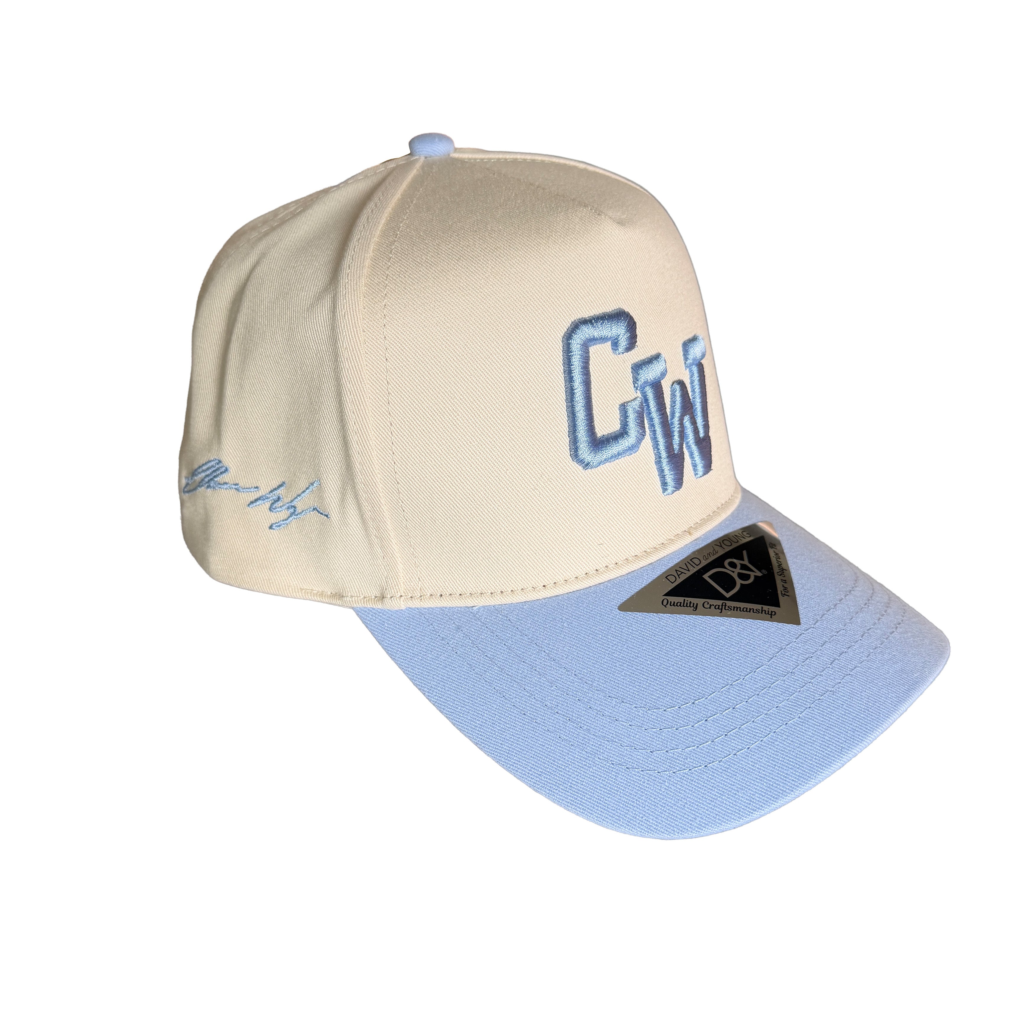 Beige and light blue cap with 'CW" branding on a white background